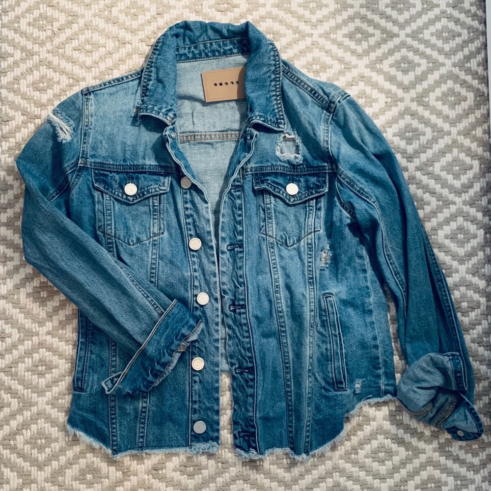 Distressed jean jacket